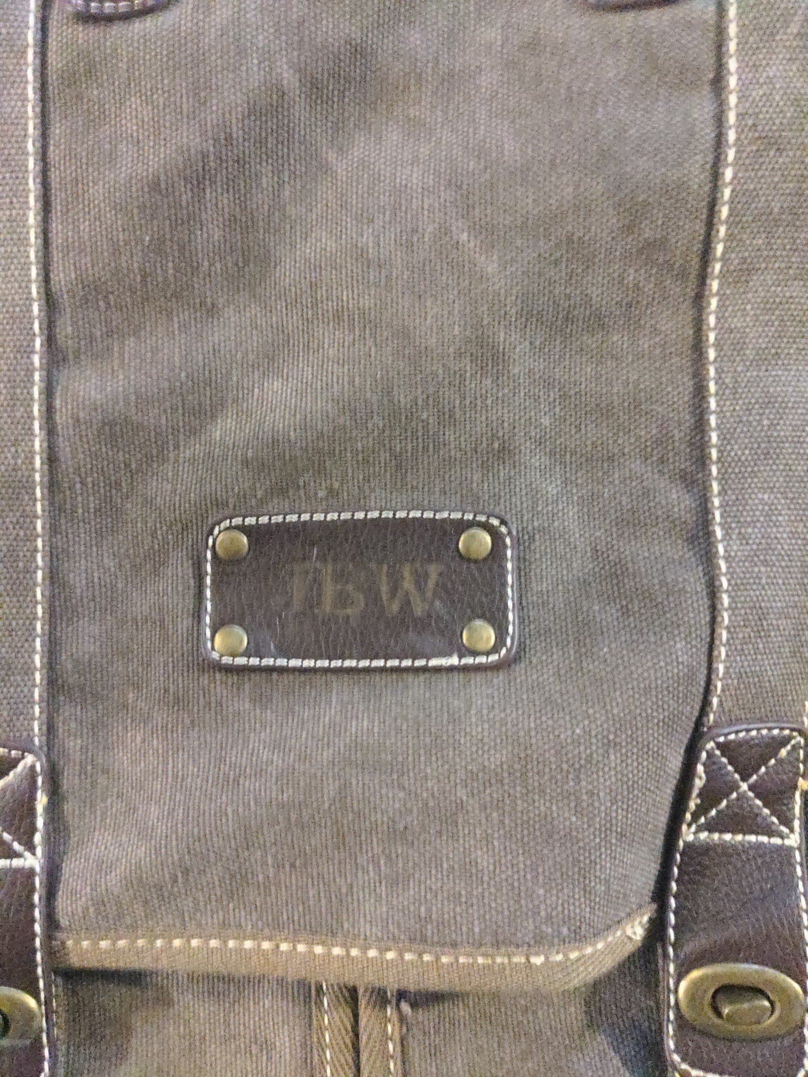 Dark brown traveling tote with multiple compartments - Thumbnail 2