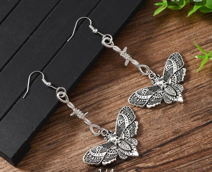 HTGothic silver - colored moth dangle earrings w/ a barbed wire accent. - Image 1