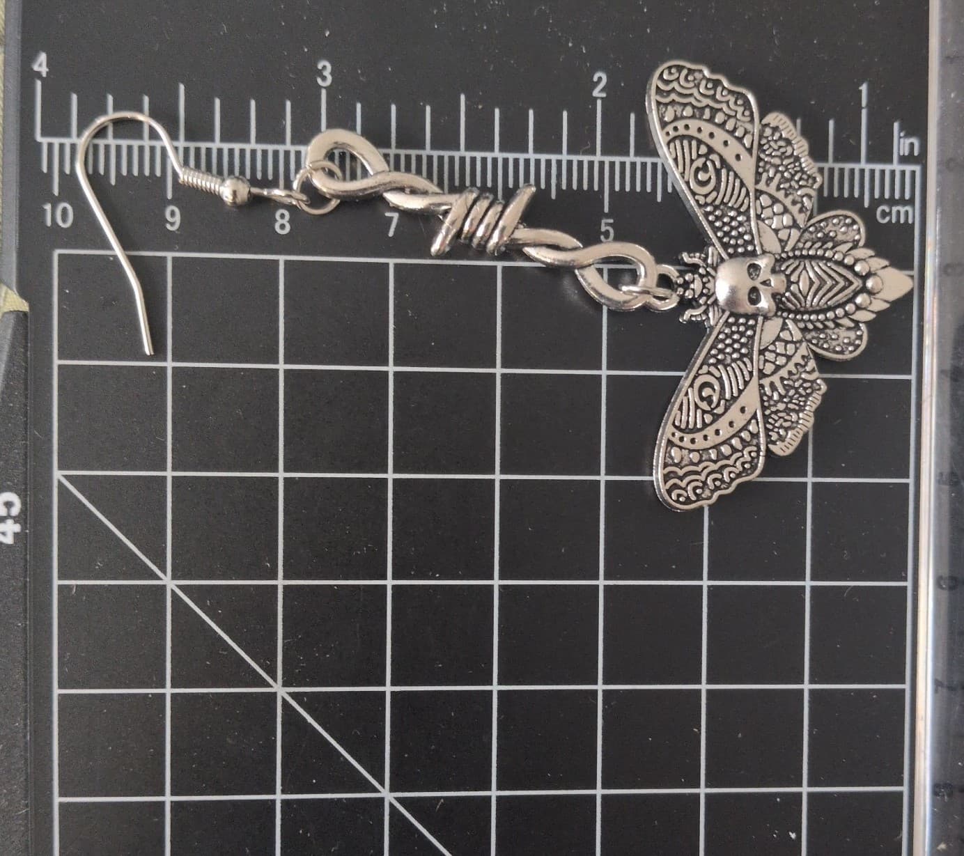 HTGothic silver - colored moth dangle earrings w/ a barbed wire accent. - Thumbnail 4