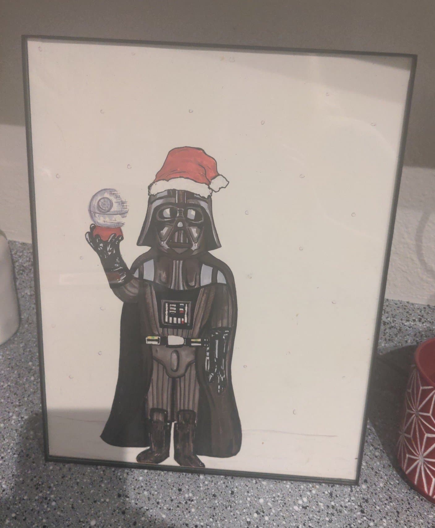 Art of darth vader with a Christmas hat in a frame - Image 1