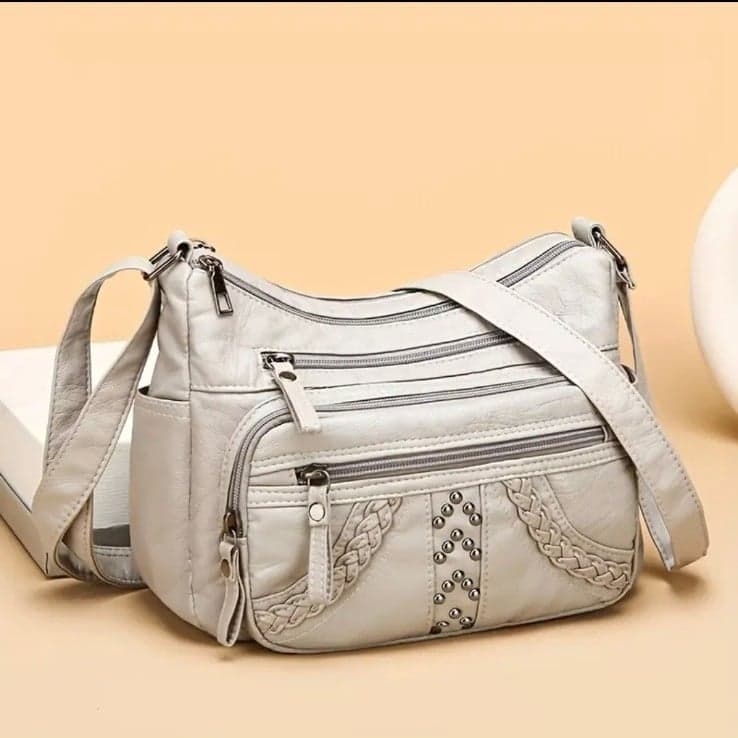 Gray Shoulder Bag with Adjustable Strap and Braided Detailing - Image 1