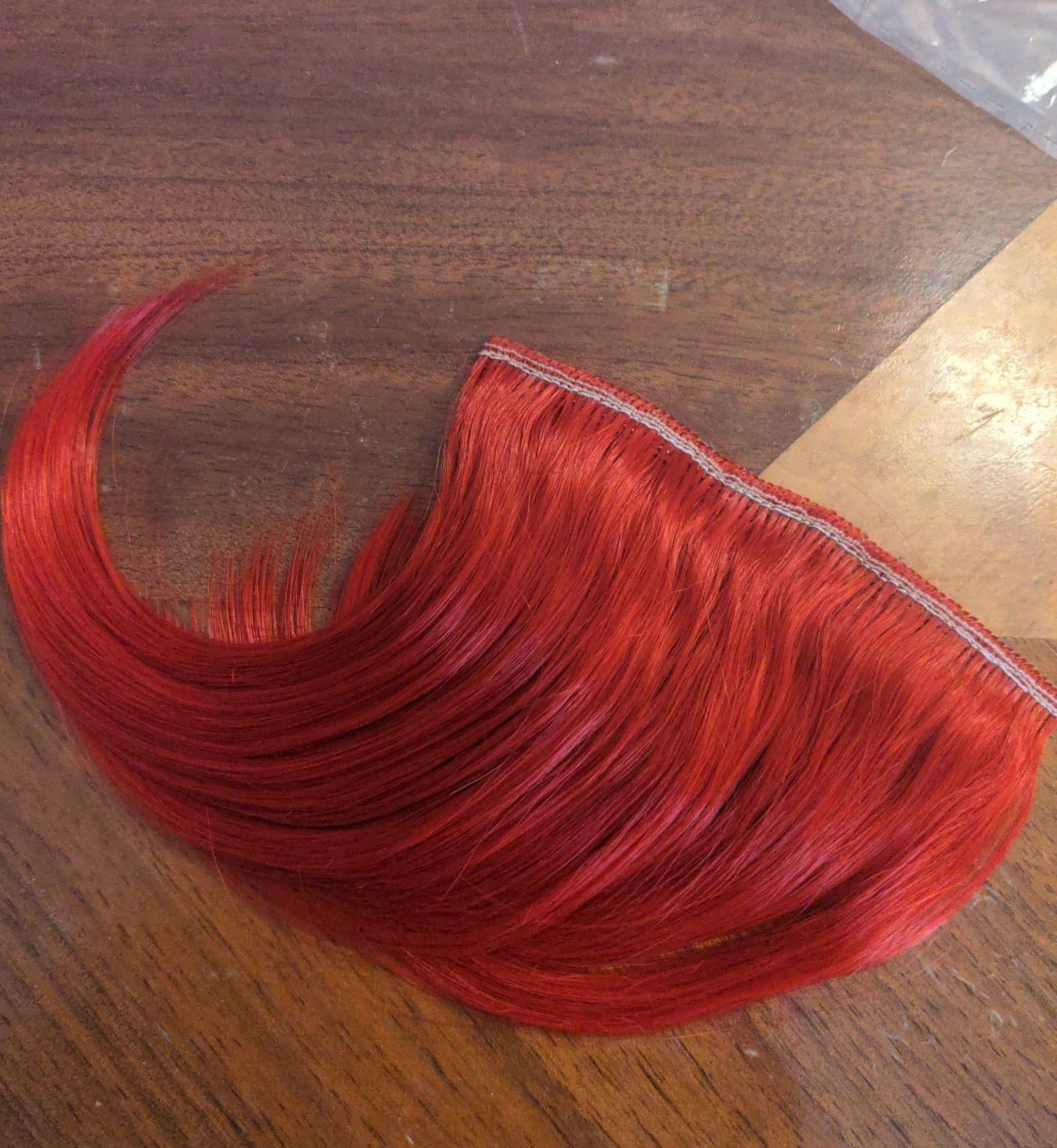 Red clip in bangs - Thumbnail 2