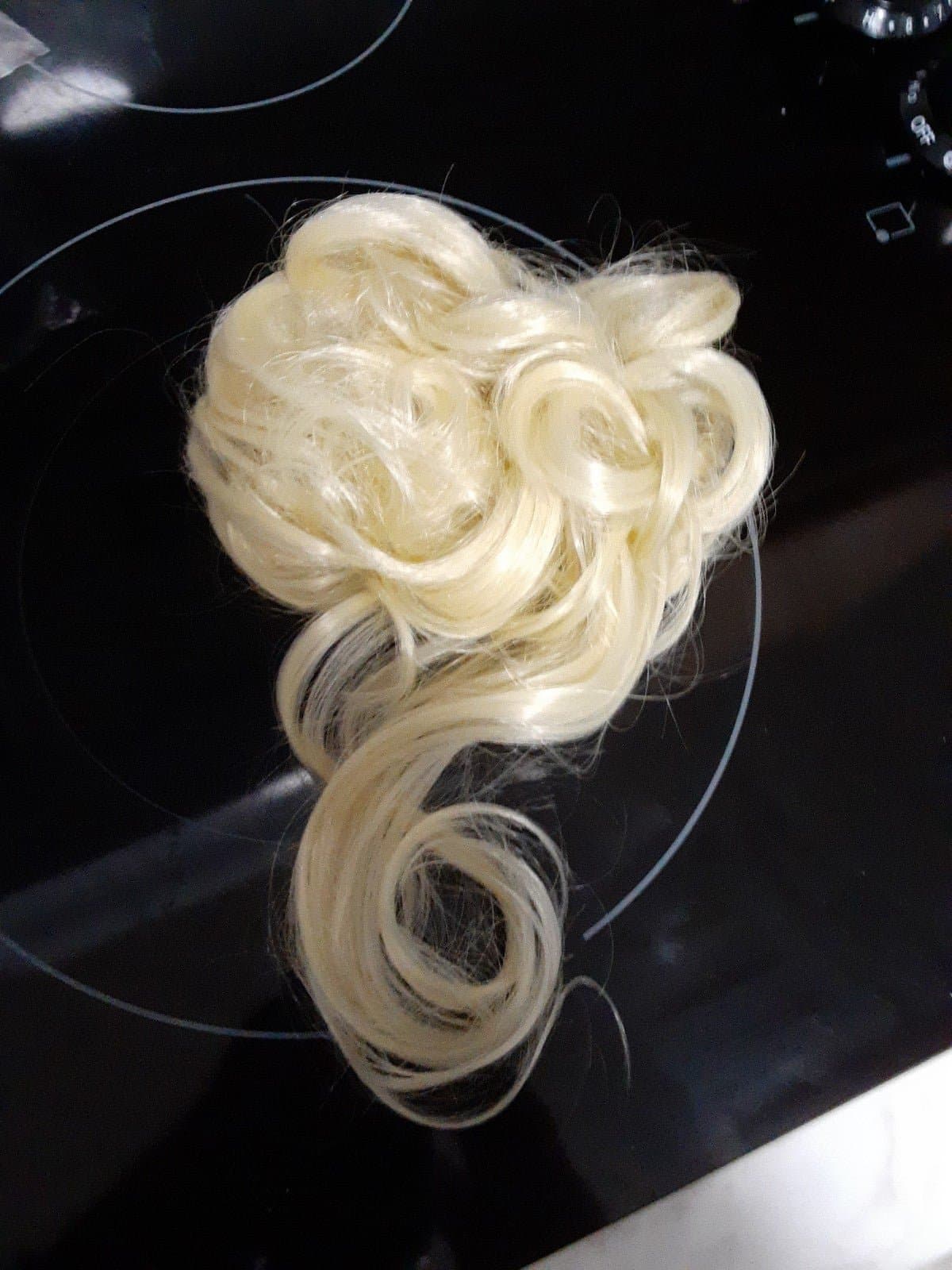 Blonde hair peice messy hair bun - Image 1