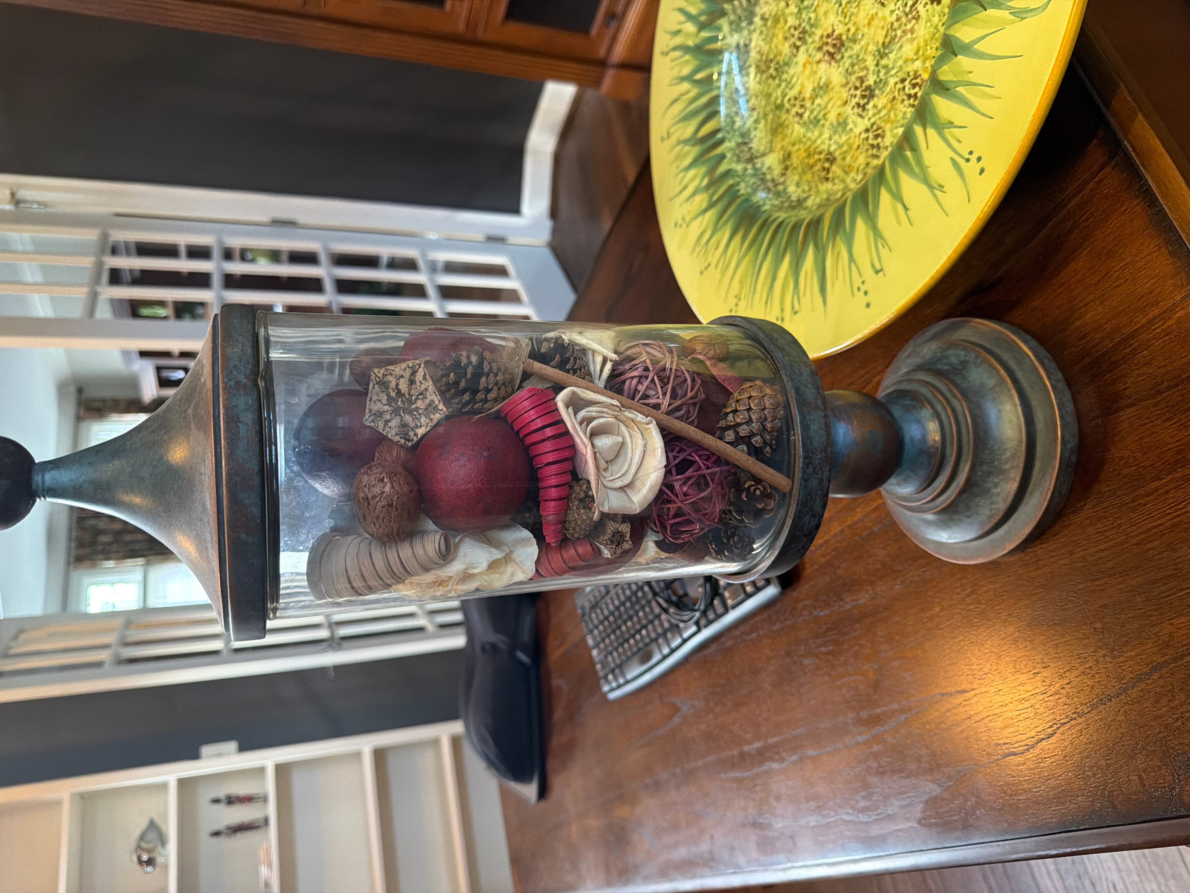 Decorative Glass Jar with Natural Elements and Lid - Image 1