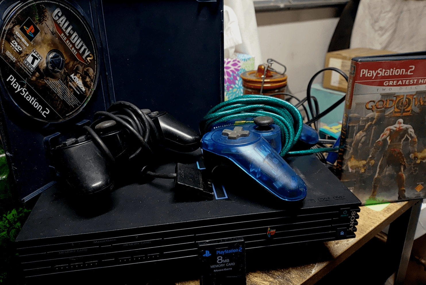 PlayStation 2 Console With 2 Controllers, Memory Card, God Of War, And Call... - Image 1