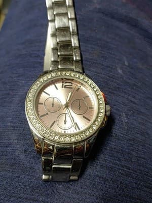 Pink Analog Wristwatch With Pink Hands. With Some Bling Around The Outside. - Image 1