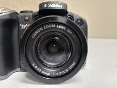 Canon PowerShot S5 IS 8.0 MP Digital Camera Black (with 6-72mm f/2.7-3.5. lens) - Image 1