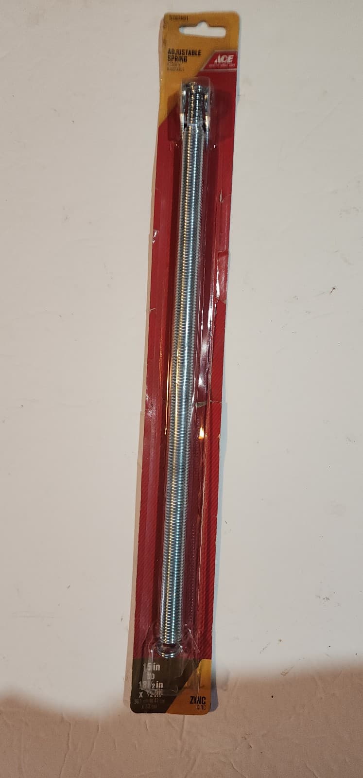 ADJUSTABLE SPRING 15"-18 1/2" X 1/2" - Image 1