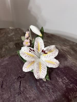 Porcelain figurine titled 'Gold Band Lily' by Hamilton Collection