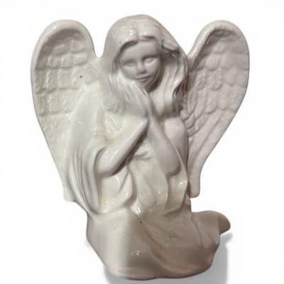 white ceramic angels figurines