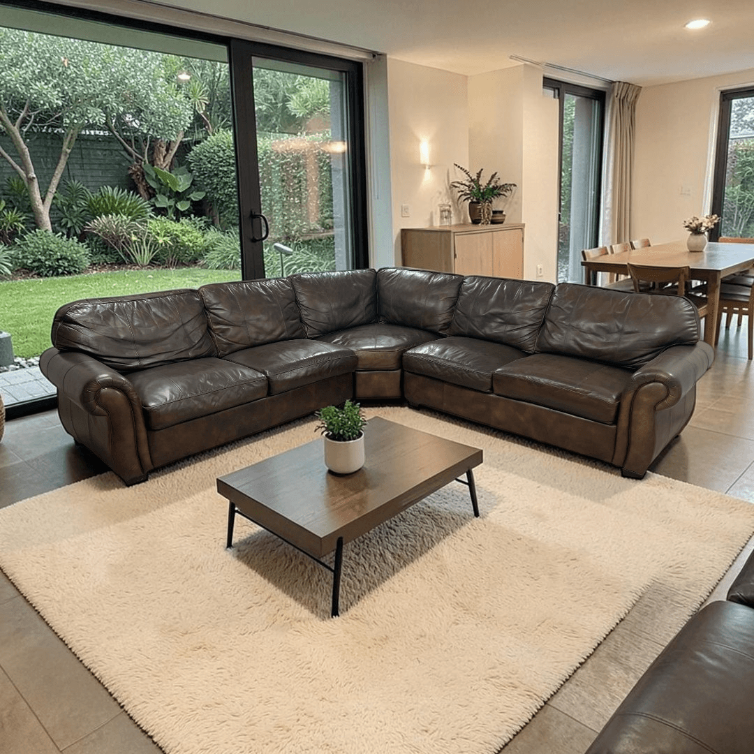 Raymour & Flanigan Dark Brown Leather Sectional Couch - Image 1