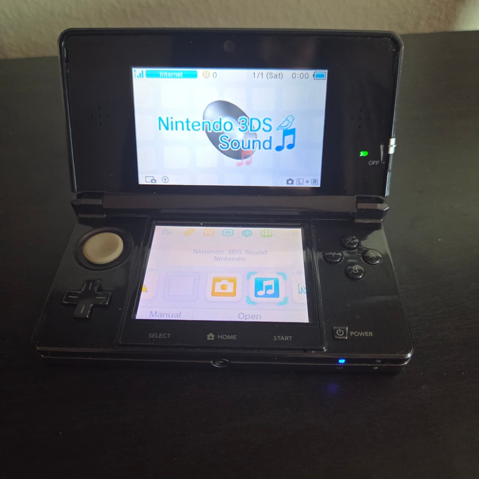 Nintendo 3DS Handheld Gaming Console in Black + Charger + SD Card - Image 1