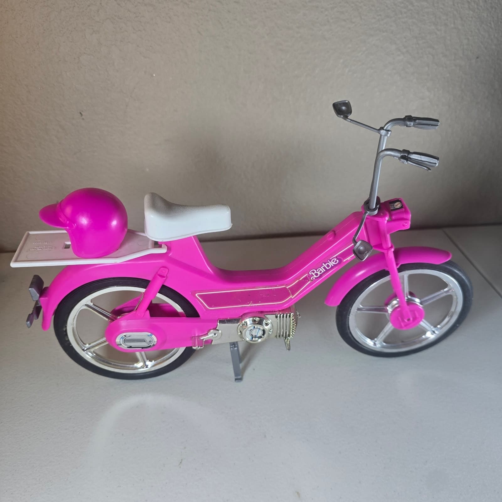 Vintage 1983 Barbie Motor Bike Pink & Silver with Helmet + Storage Rack - Image 1