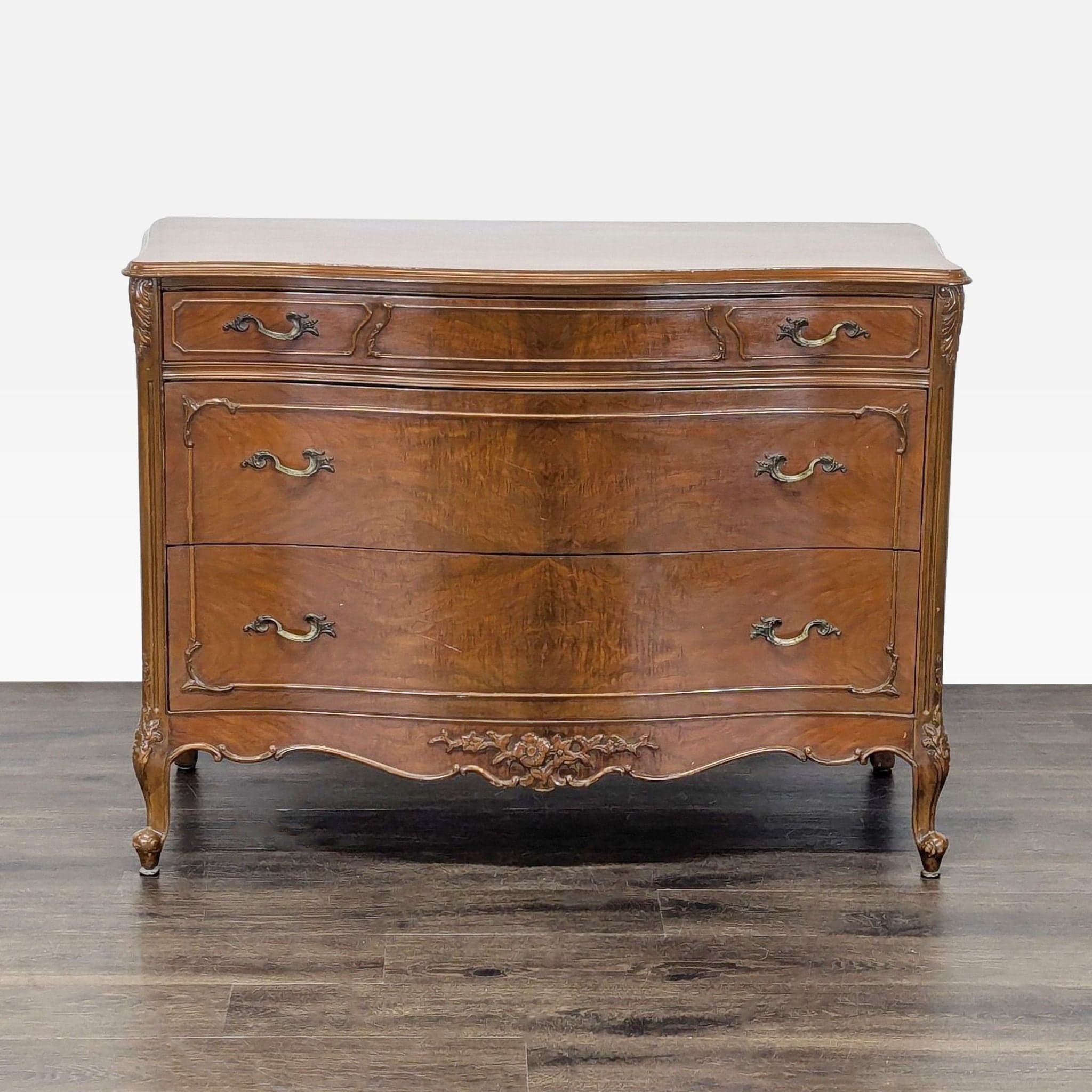 John Stuart Inc. Classic Wooden Dresser with Curved Drawers and Ornate Detailing - Image 1
