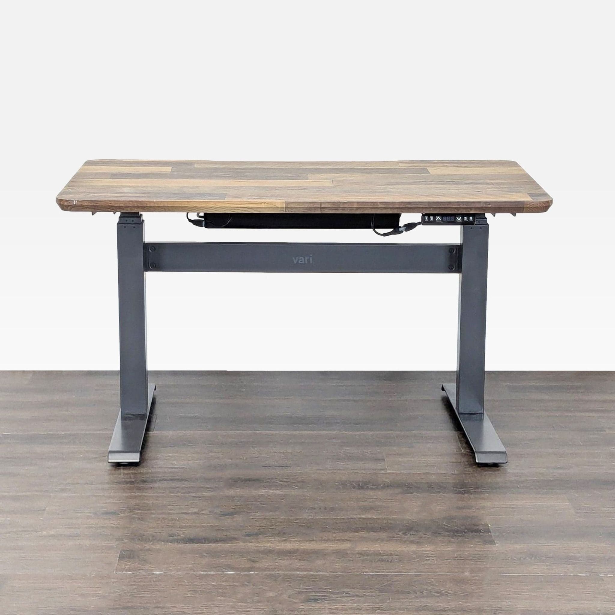 Varidesk Electric Adjustable Standing Desk - Wood Finish - Image 1