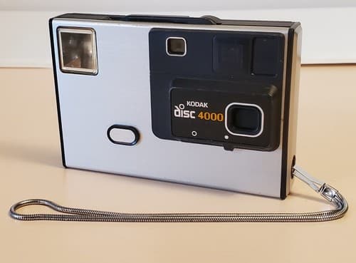 Vintage 1983 Kodak Disc 4000 Camera by EASTMAN KODAK COMPANY with strap - Image 1