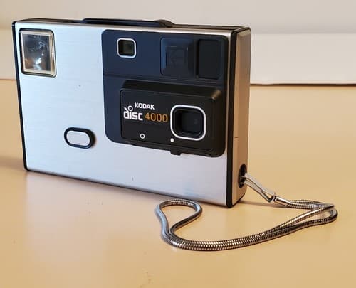 Vintage 1983 Kodak Disc 4000 Camera by EASTMAN KODAK COMPANY with strap - Thumbnail 11