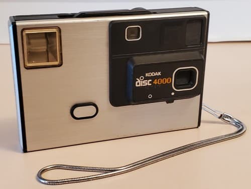 Vintage 1983 Kodak Disc 4000 Camera by EASTMAN KODAK COMPANY with strap - Thumbnail 4