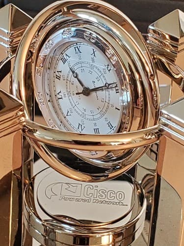 BENCHMARK The Silver Celestial Quartz Clock. Gyro-rotating. CISCO branded. NEW - Image 1