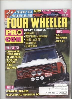 Four Wheeler September 1998 Trail Action Ford vs Chevy Magazine - Image 1