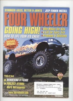 Four Wheeler March 2003 Going High Lift Kits Magazine - Image 1
