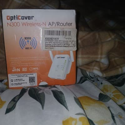 OptiCover WiFi Extender with WPS Internet Signal Booster - Image 1