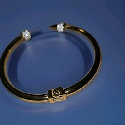 PAVE EDGED CONE HINGED BANGLE BRACELET-GOLD - Image 1