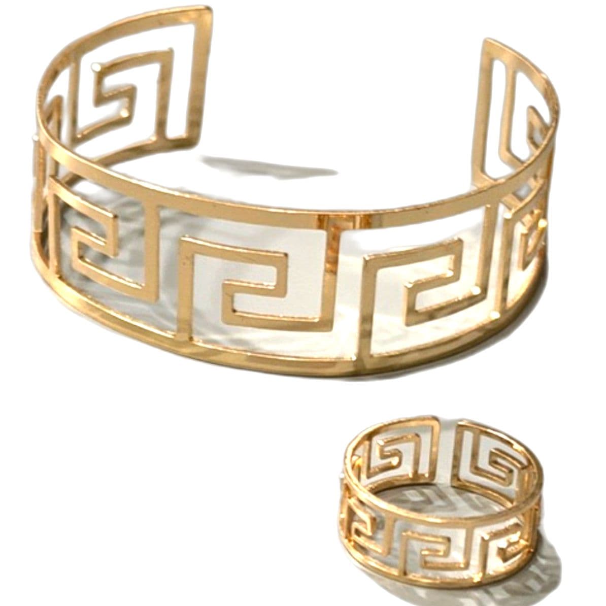 A Set Of Geometric Cut Bracelet And Ring Set - Image 1