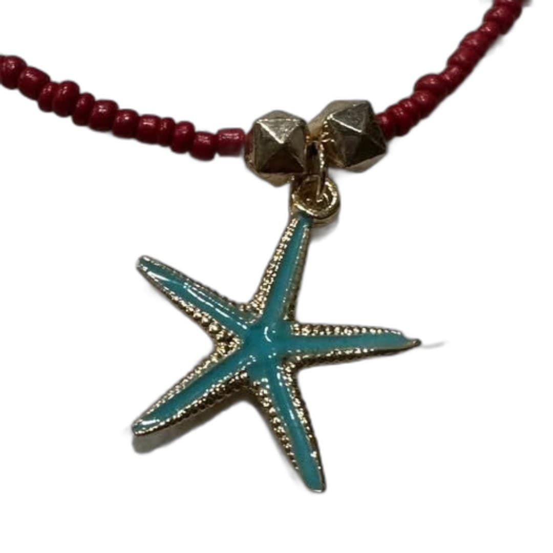 Elegant red beaded necklace featuring a charming starfish pendant. - Image 1