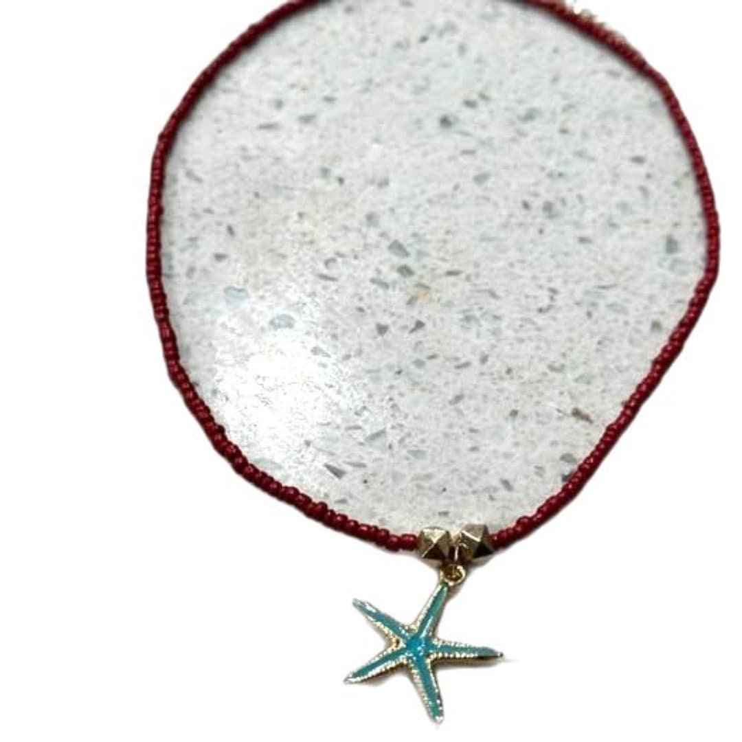 Elegant red beaded necklace featuring a charming starfish pendant. - Thumbnail 6