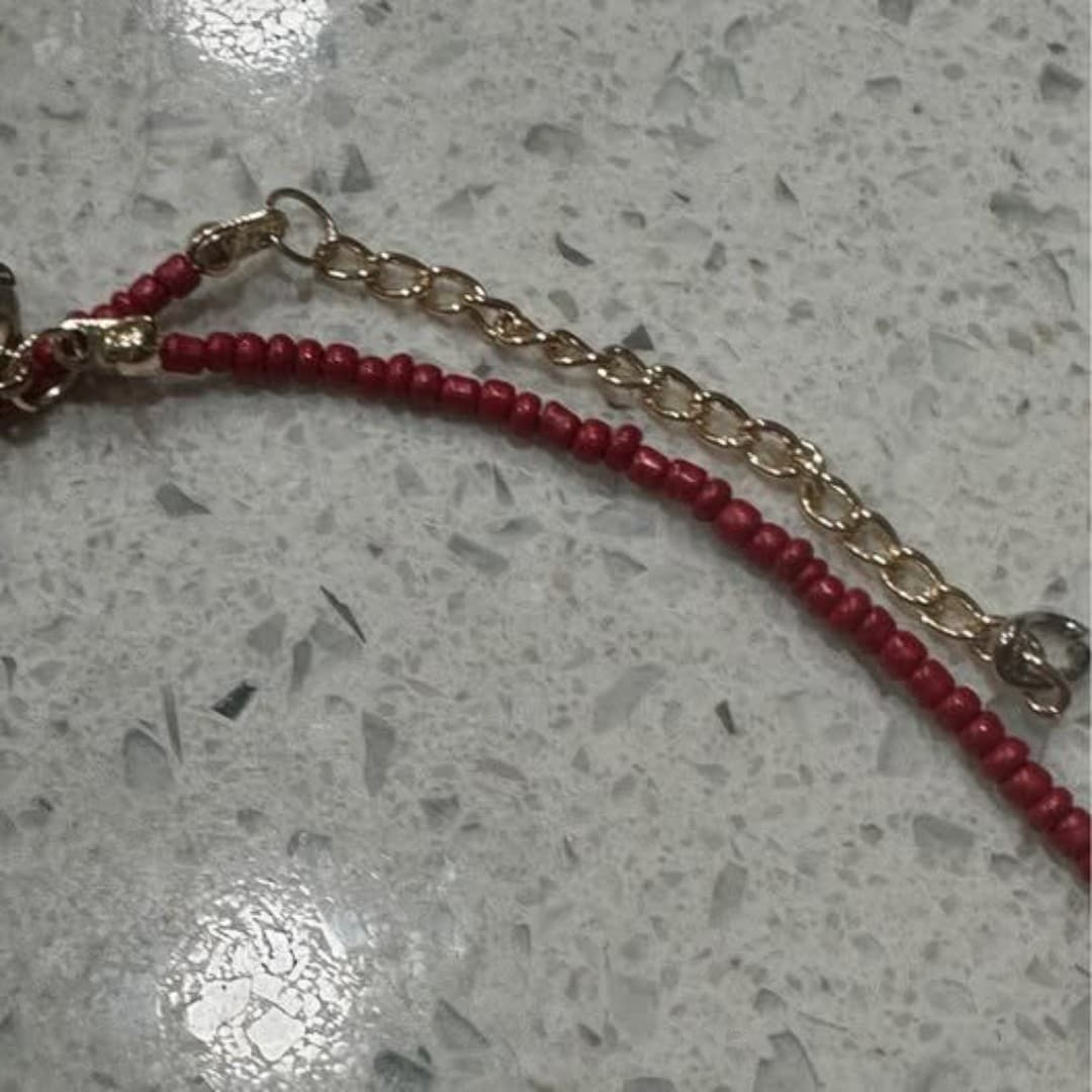 Elegant red beaded necklace featuring a charming starfish pendant. - Thumbnail 5