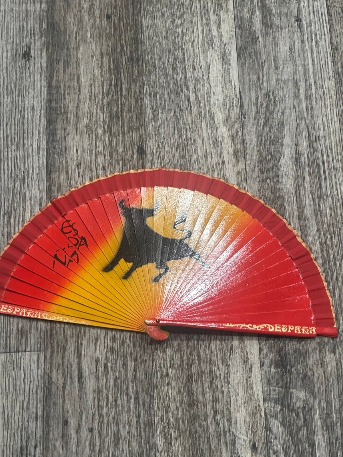 item is a traditional Spanish folding fan (abanico) featuring the iconic Bull - Image 1