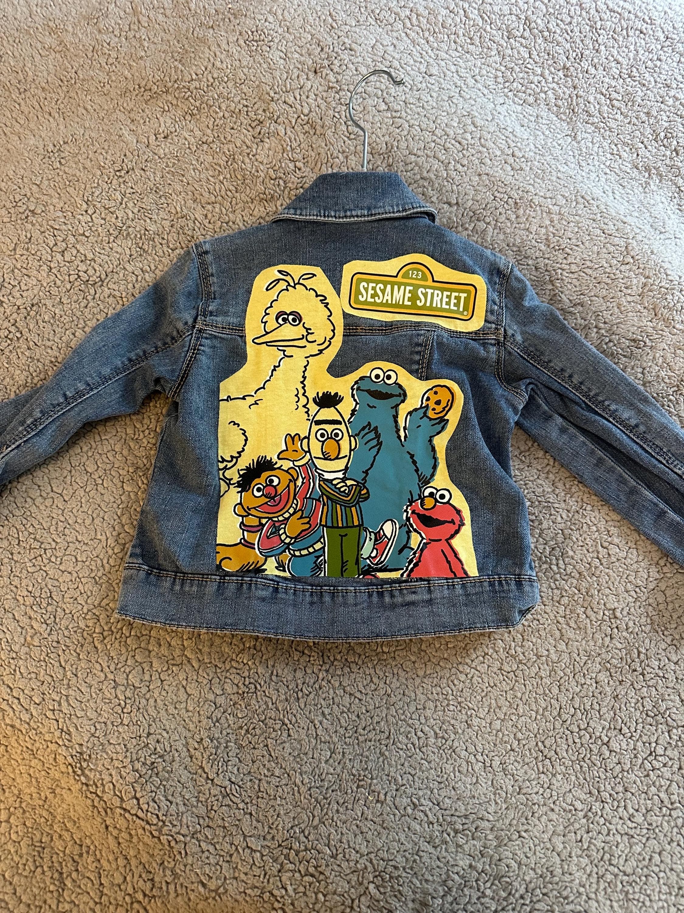 Denim jacket with Sesame Street on the back - Image 1