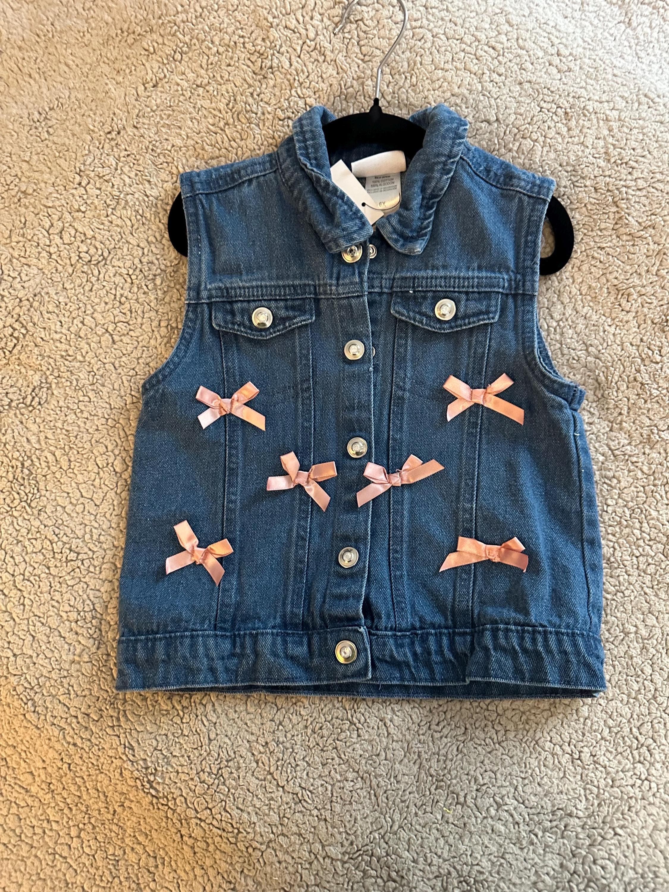 Denim vest with butterfly glitter on back with pink bows on front - Thumbnail 2