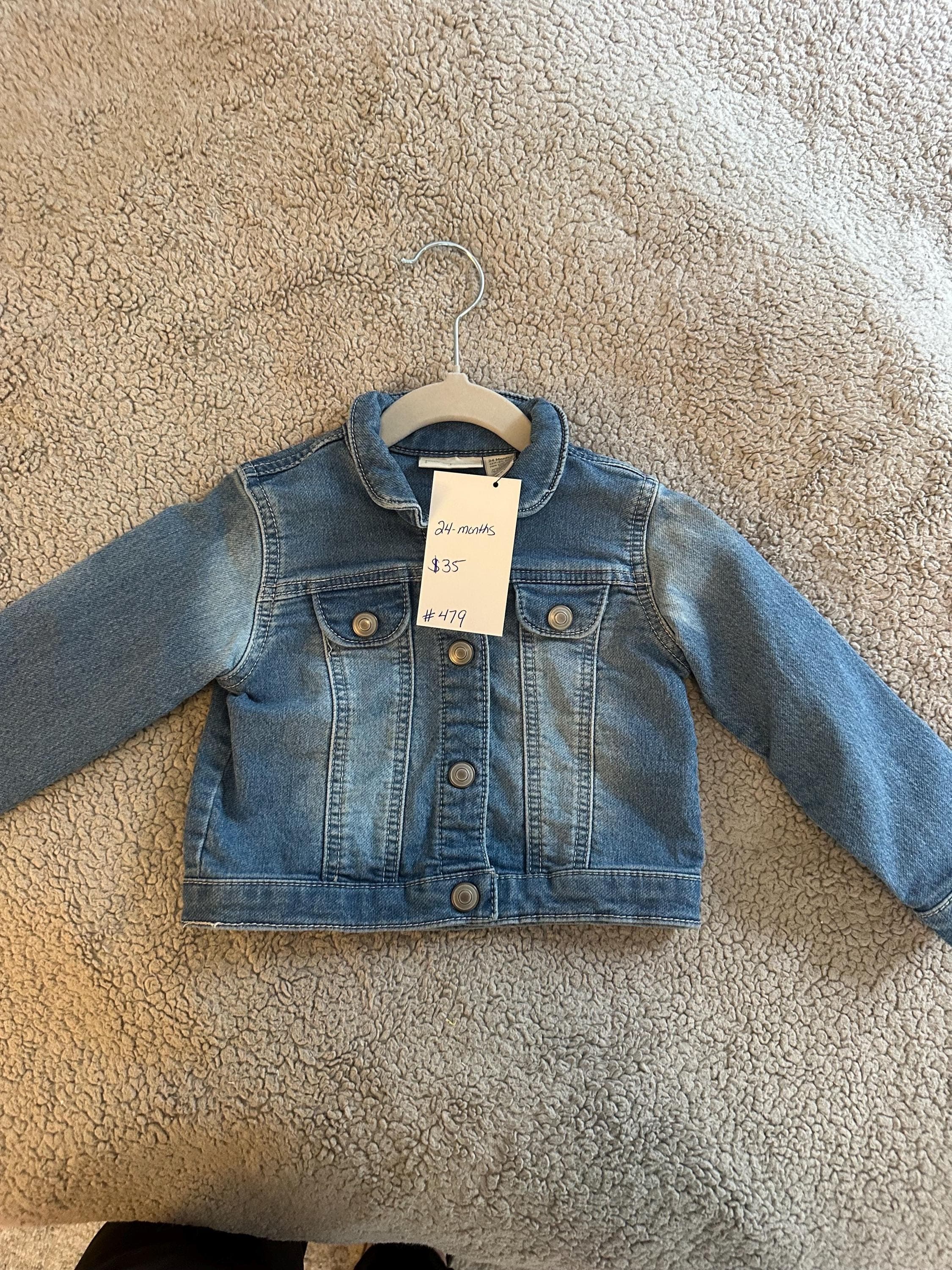 A loader and dump truck on back of denim jacket - Thumbnail 2