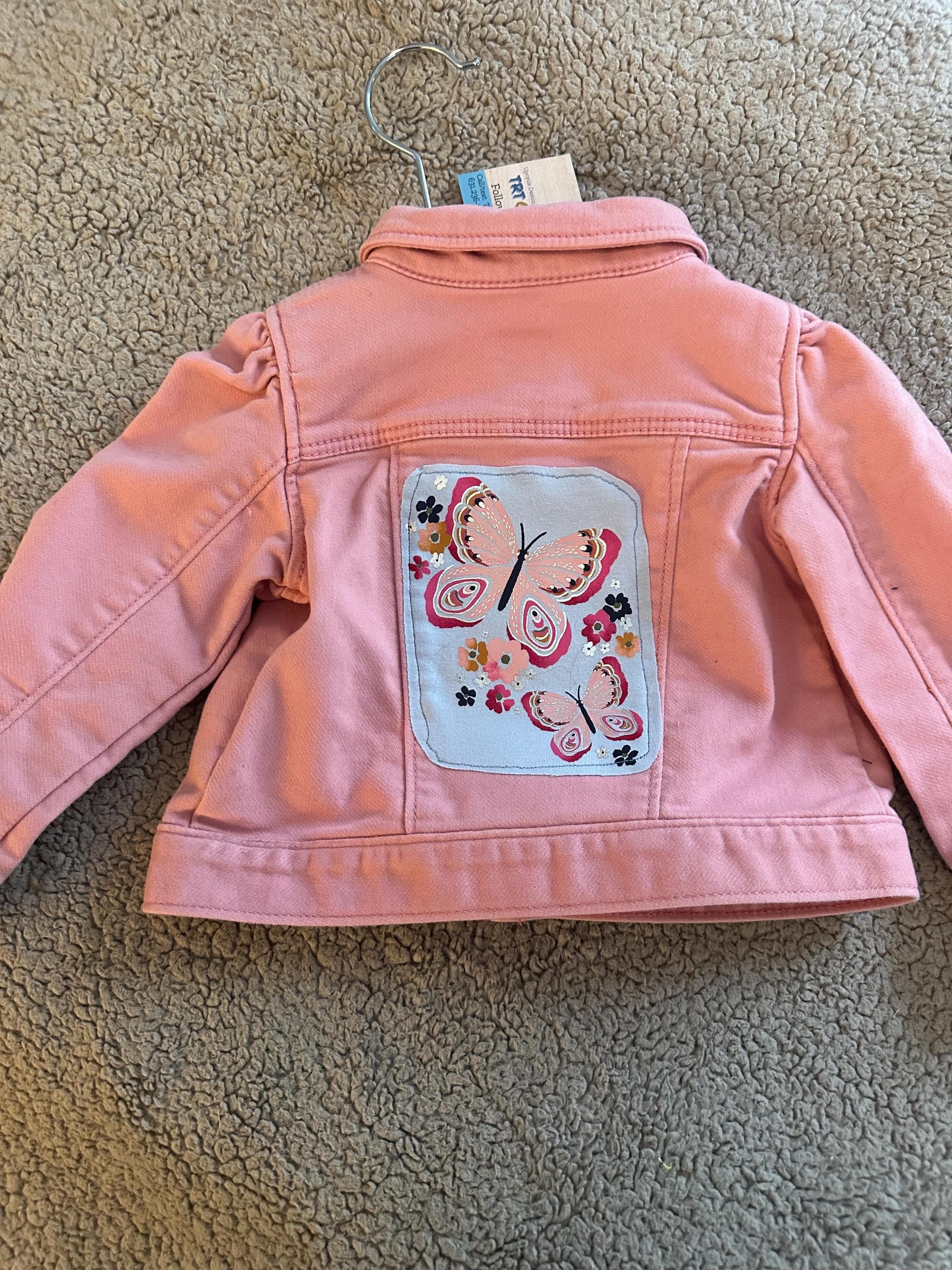Pink denim jacket with pink butterflies on the back - Image 1