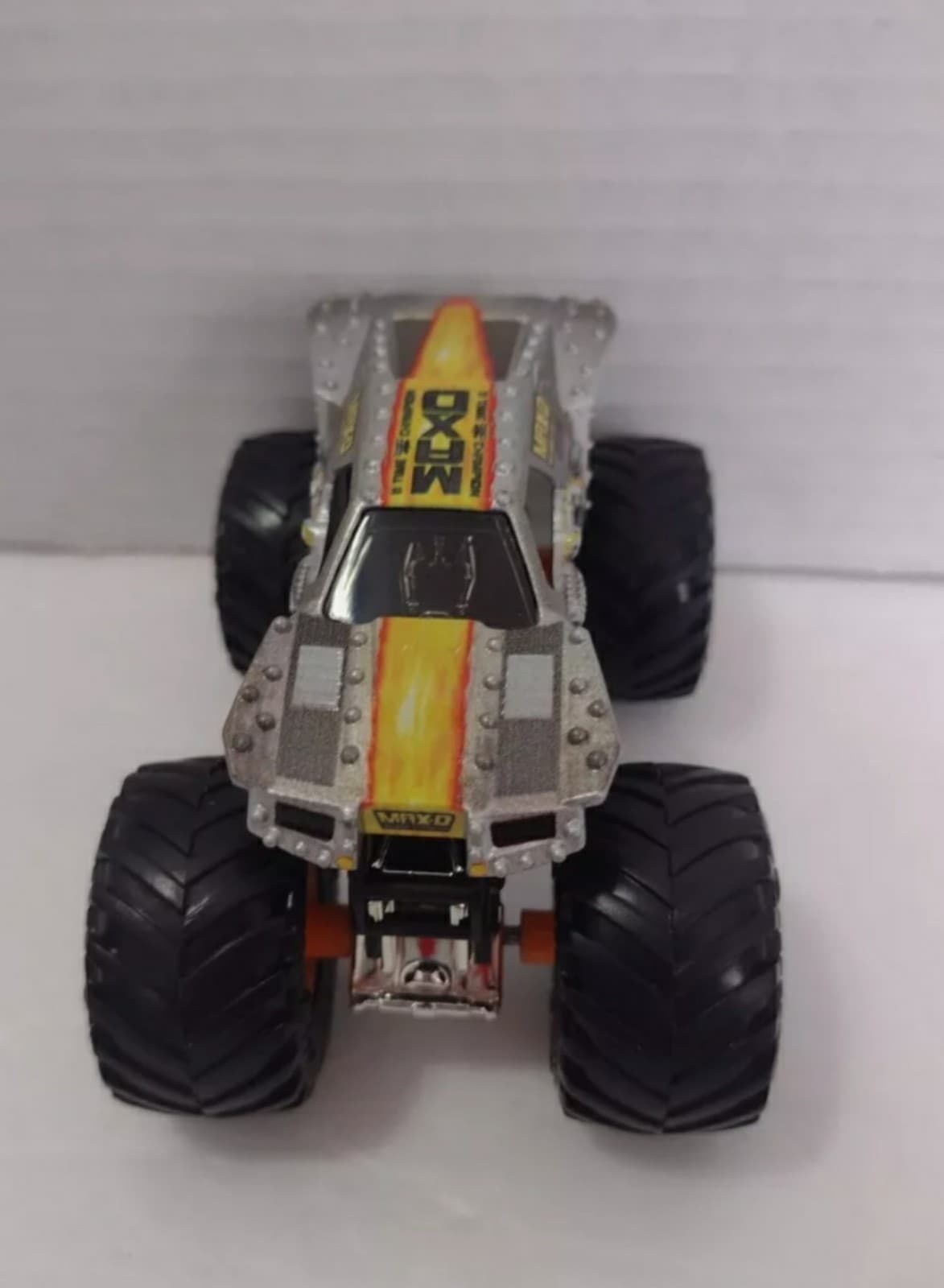 Hot Wheels Monster Jam Max D 1:64 Monster Truck Die-Cast Mud Tires - Image 1