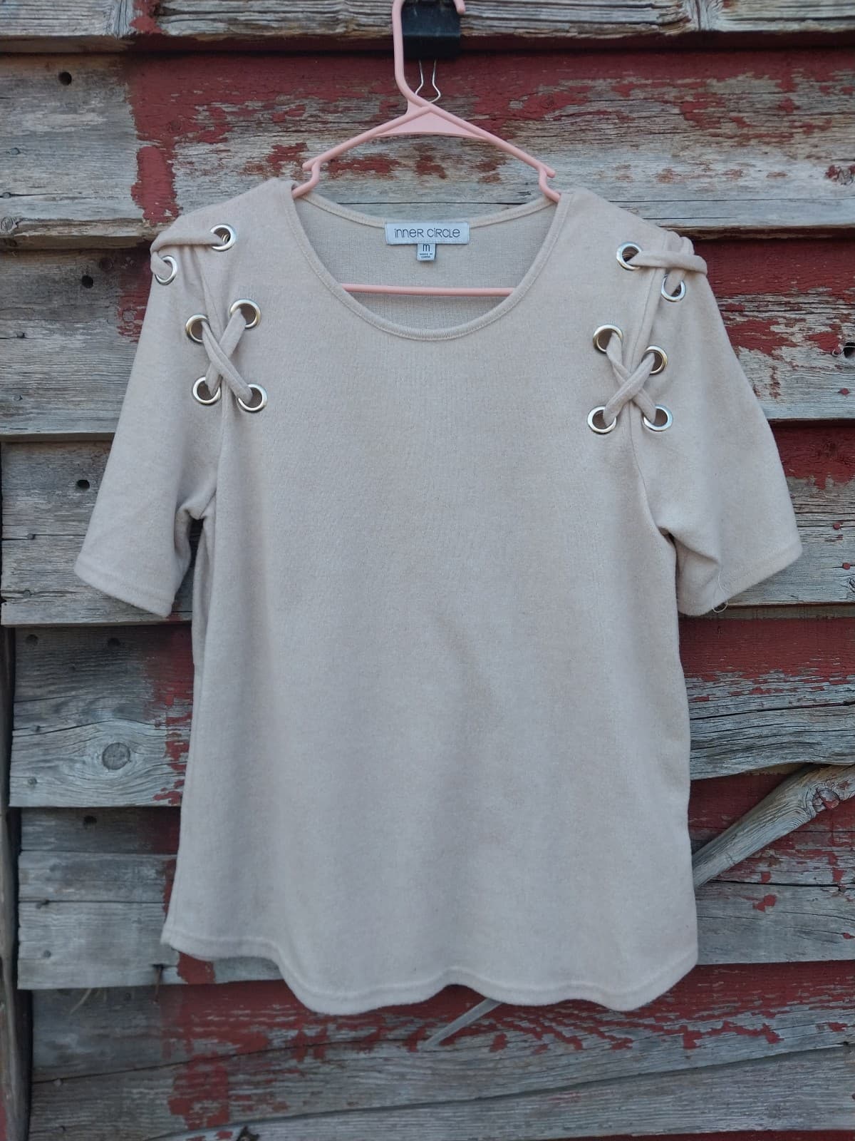 Inner Circle short sleeved top with criss cross design in each shoulder - Image 1