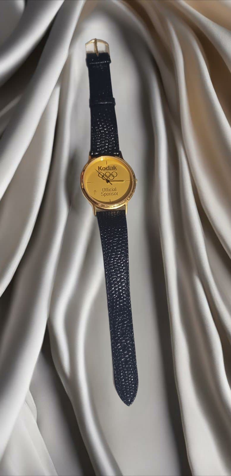 Vintage Kodak Olympic Watch Gold Tone Black Leather Band. Wind-Up Watch - Image 1