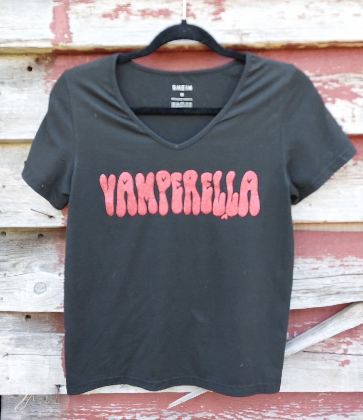 Shein "Vamperella" Black & Red is a V Neck shirt. Size Medium. Never Worn - Image 1