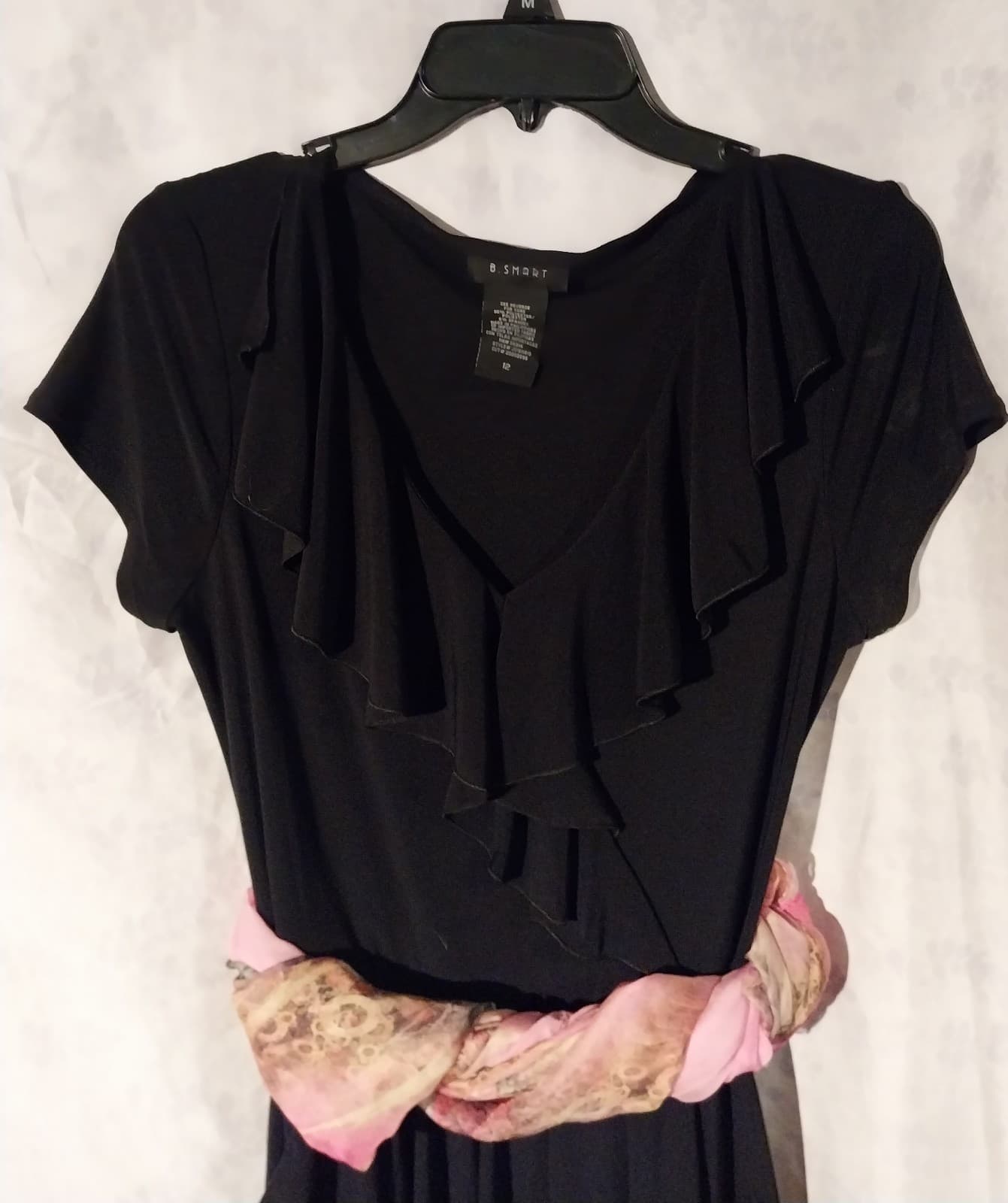 B. Smart Black Dress with Ruffles and Pockets - Image 1