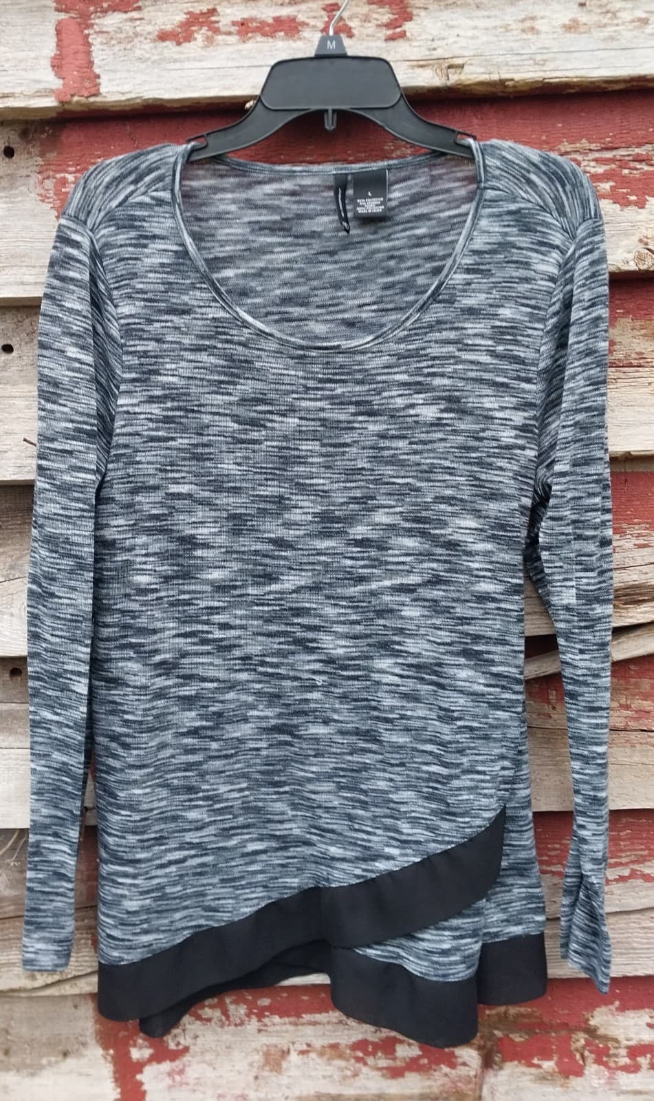 New directions gray and black long sleeve with black Ruffle at bottom of shirt - Image 1