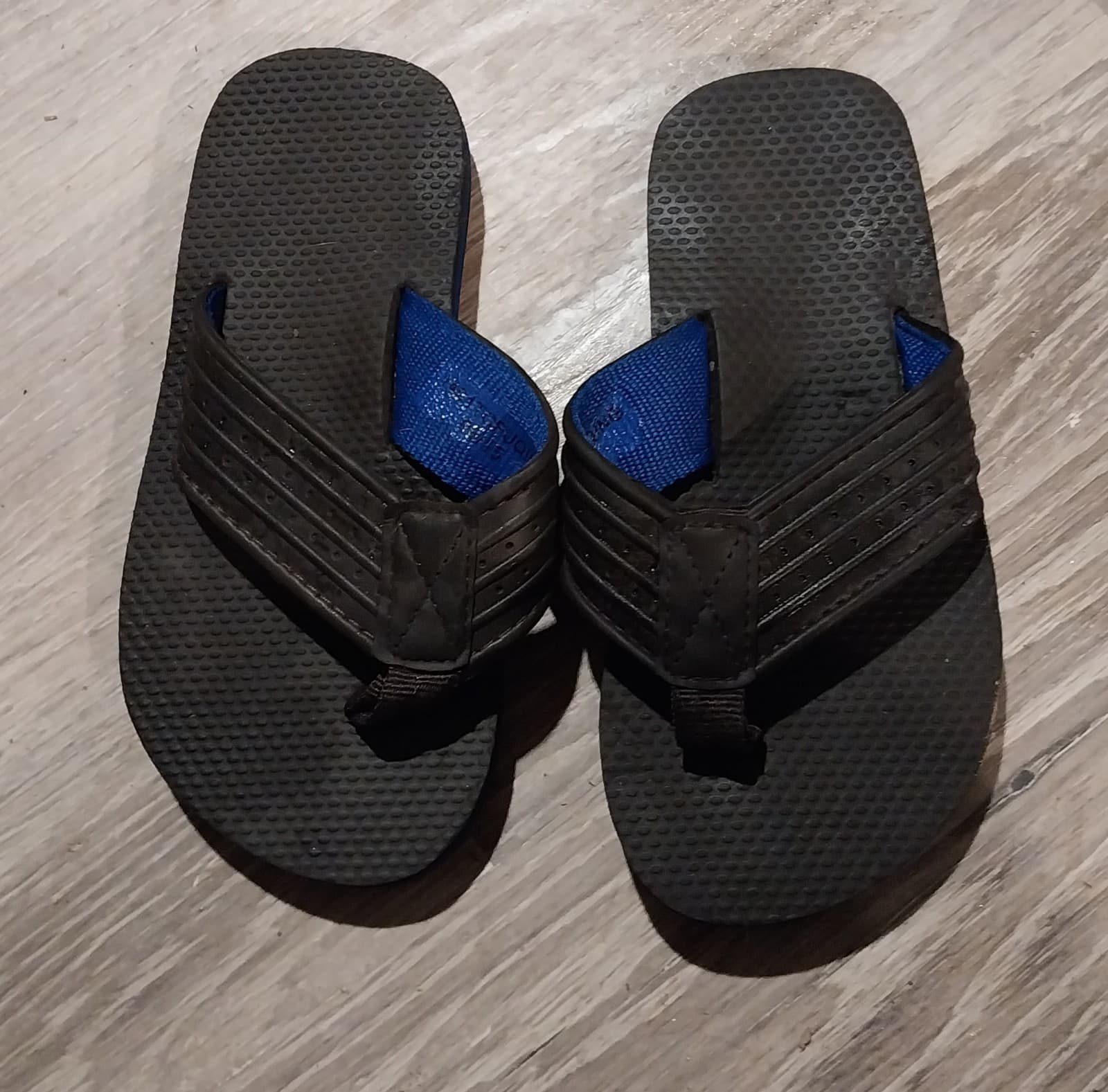 Black sandals in toddler size. - Image 1