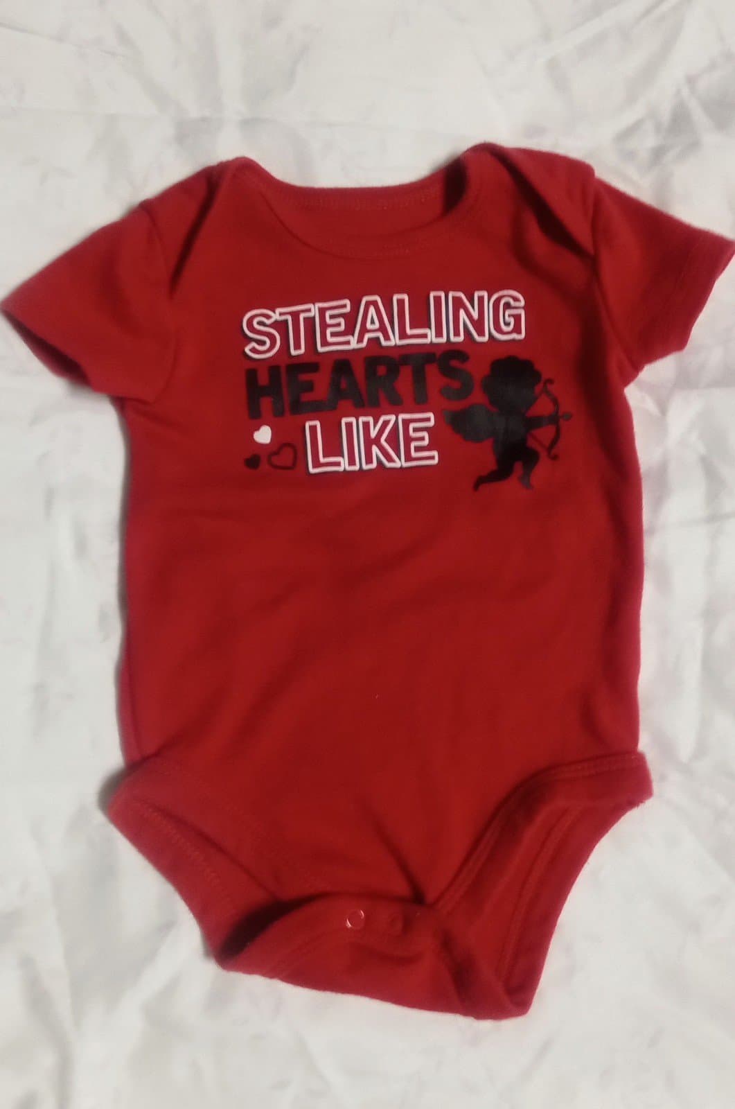 Stealing Hearts Like. Unisex Baby Boys or Girls Onesie. 0-3 Months. - Image 1