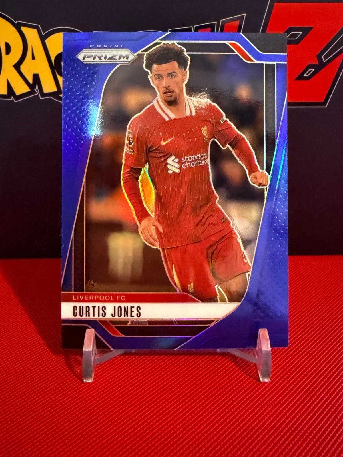 2024-25 Panini Prizm Premier League Curtis Jones Blue #/299 Liverpool - Image 1
