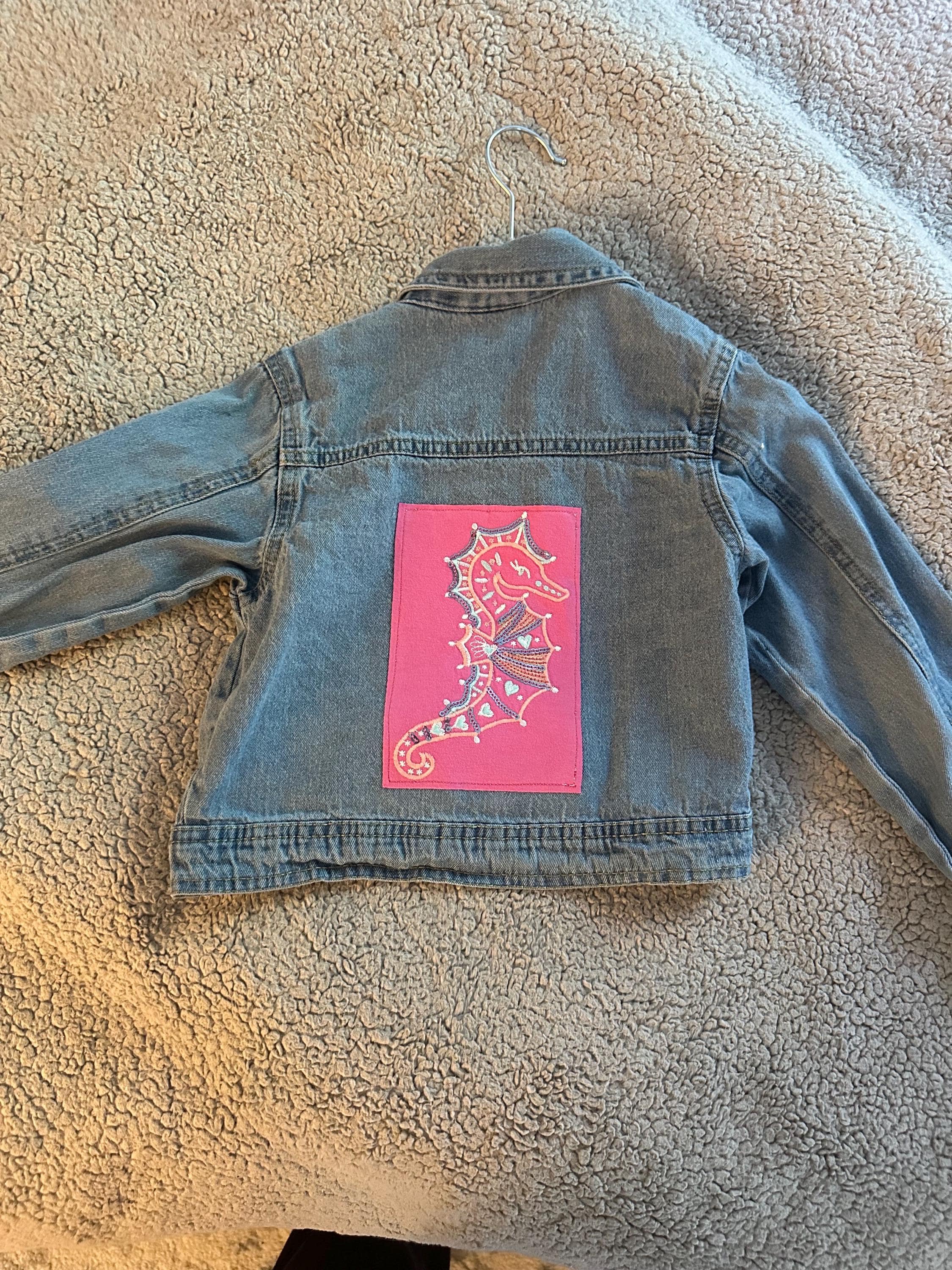 Denim jacket with a seahorse on the back - Image 1