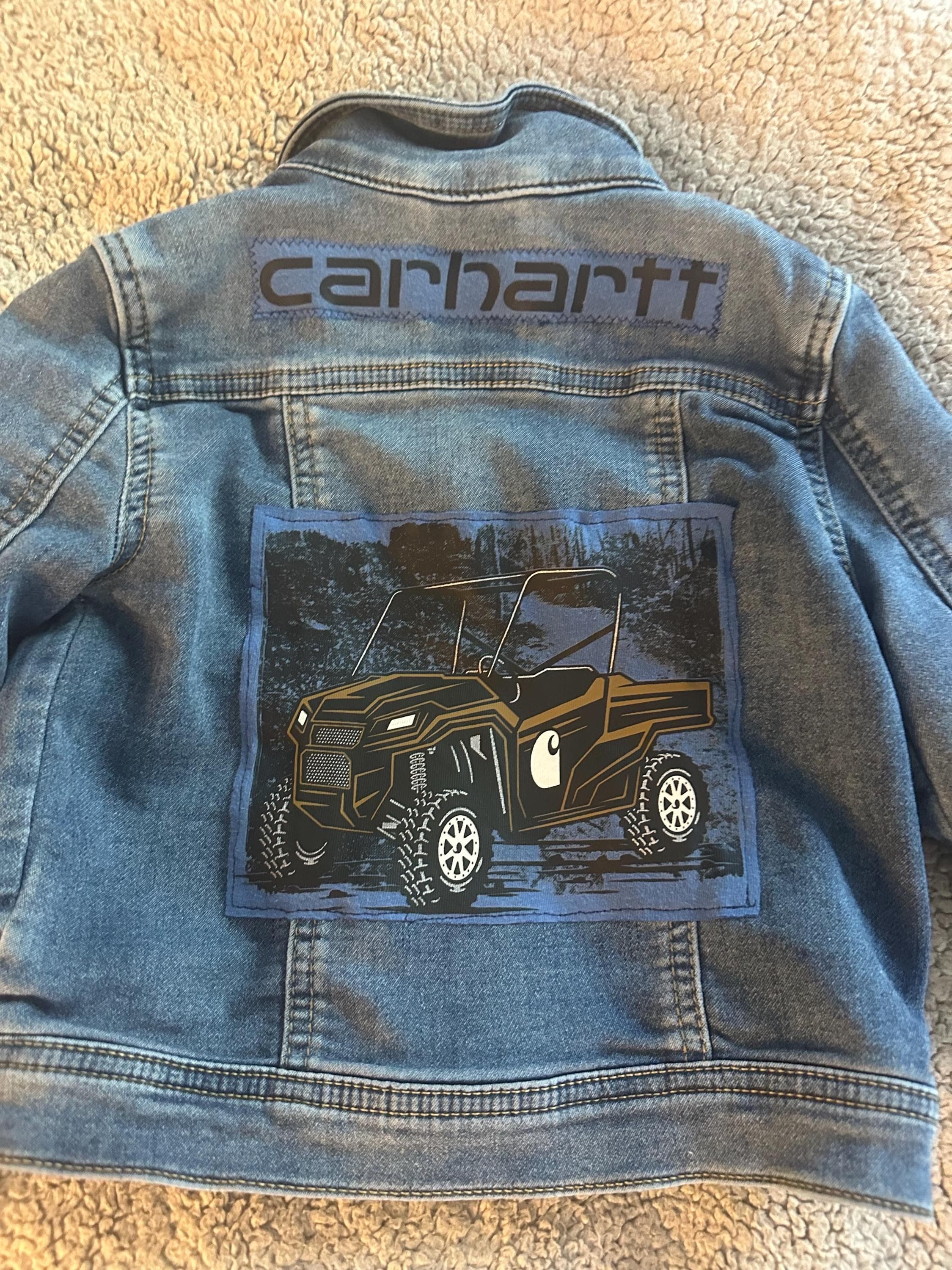 Denim jacket with Carhartt image on back - Image 1