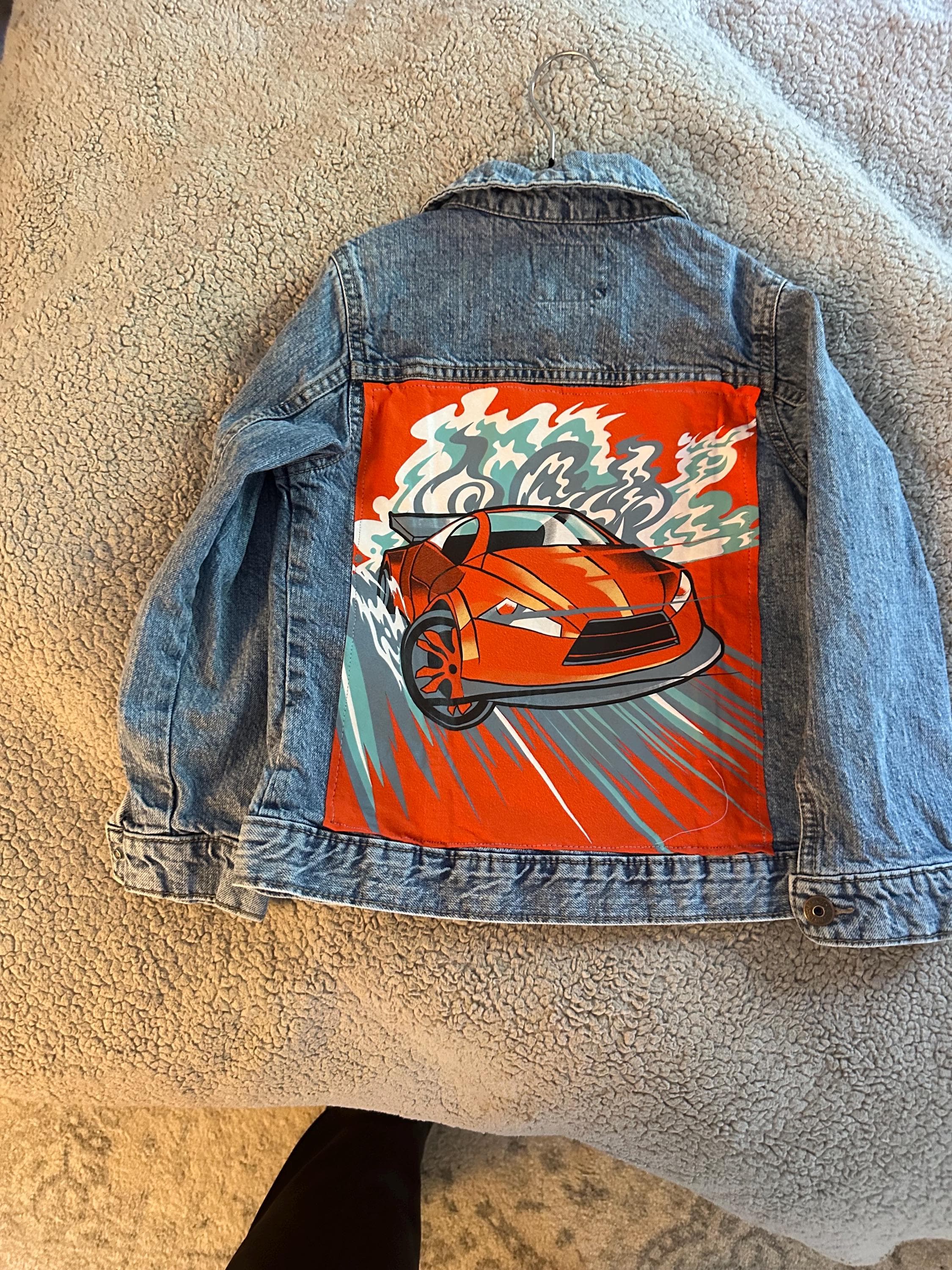 Denim jacket with race car on back - Image 1
