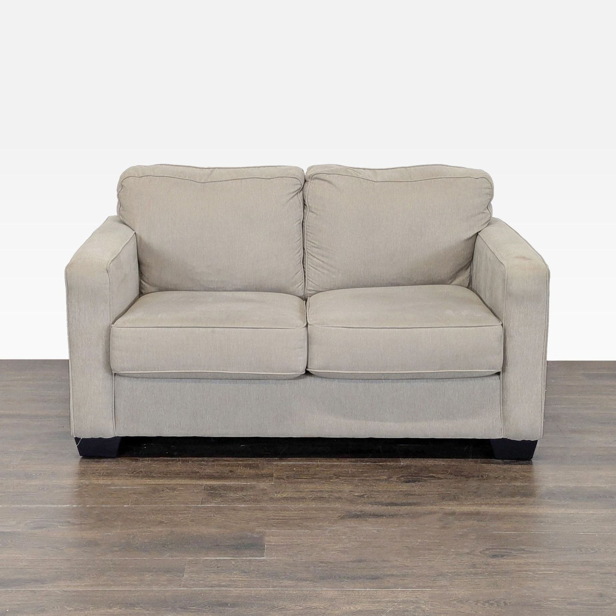 Ashley Furniture Beige Loveseat – Comfortable 2-Seater Sofa - Image 1