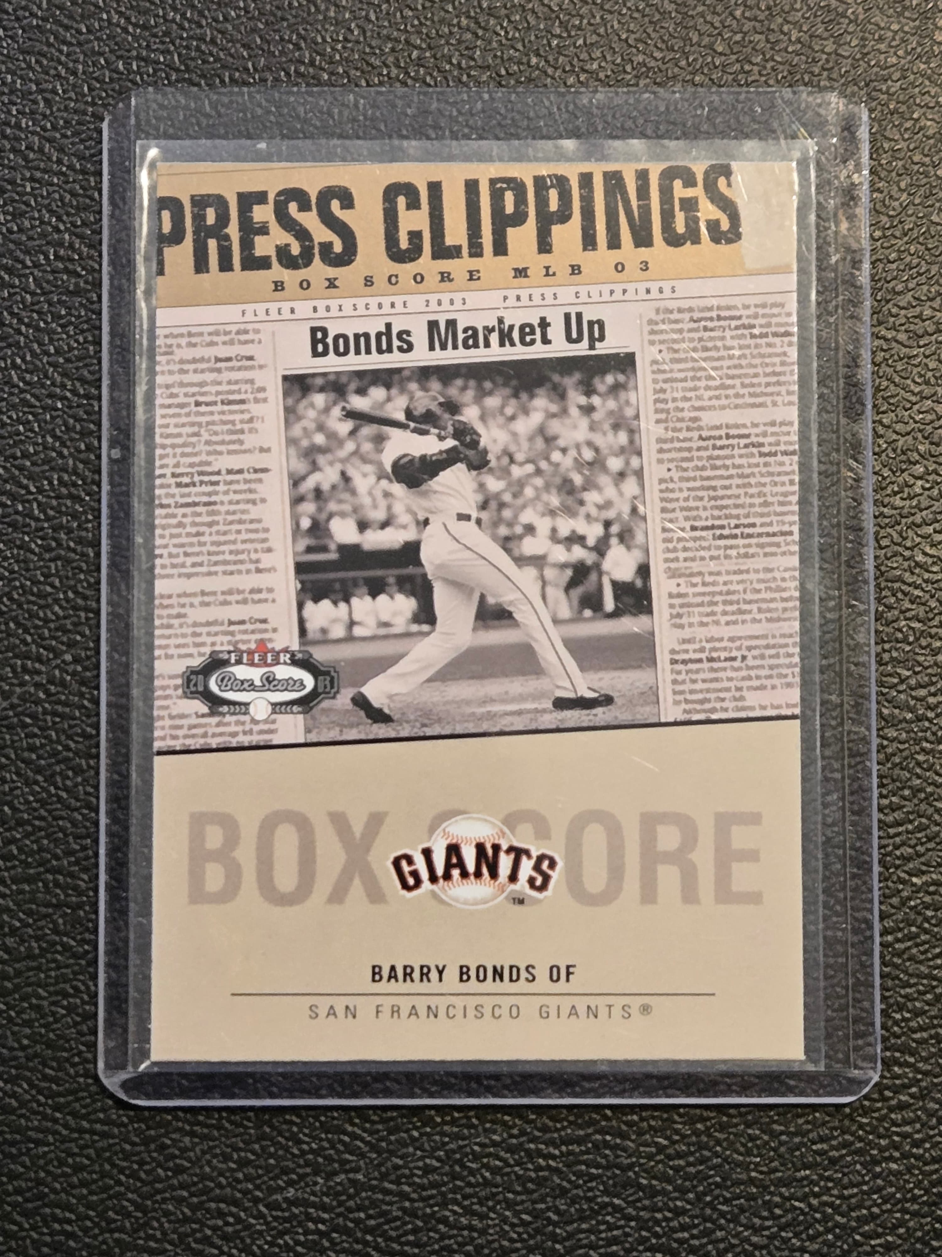 2003 Fleer Box Score #4 PC Barry Bonds Press Clippings - Image 1